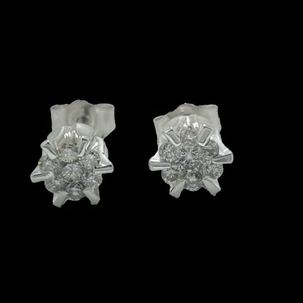 BOUCLES D'OREILLES FLEUR EN OR GRIS 750 SERTIES DE 7 DIAMANTS