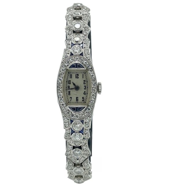 OMEGA VINTEGE DAME PLATINE 950 ET OR GRIS 18K SERTIE D'ENVIRON 7 CTS DE DIAMANTS ET SAPHIR 14X29MM