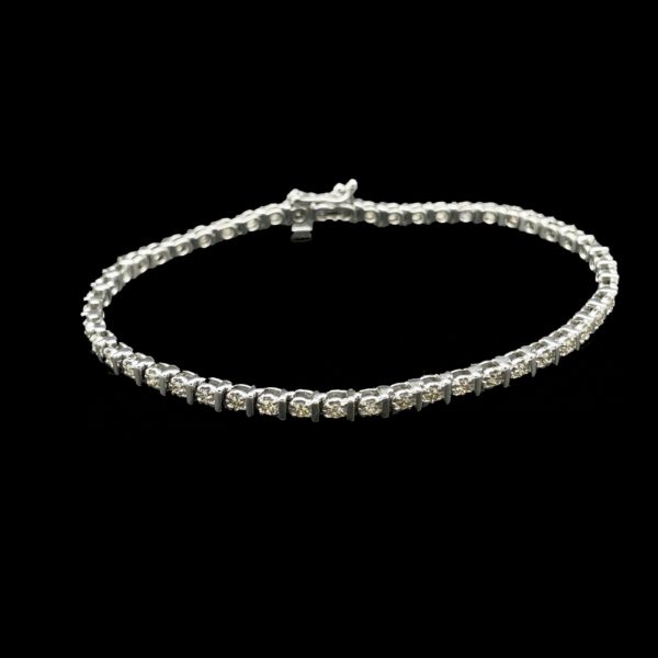BRACELETS TENNIS SERTI DE 50 DIAMANTS ET OR GRIS 9K/333