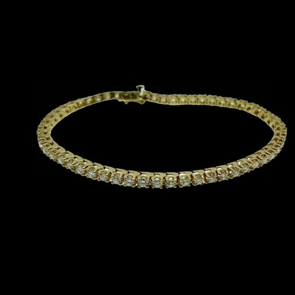 BRACELETS TENNIS SERTI DE 56 DIAMANTS ET OR JAUNE 14K/585
