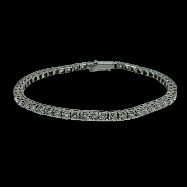 BRACELETS TENNIS SERTI DE 54 DIAMANTS ET OR GRIS 18K/750