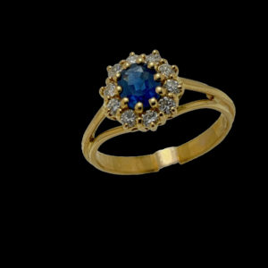 BAGUE OR JAUNE 18K FLEUR SERTIE D'UN SAPHIR ET DE 10 DIAMANTS TAILLE 51/52