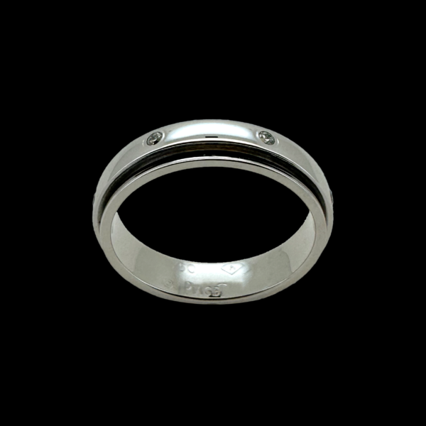 BAGUE PIAGET POSSESSION EN OR GRIS 750 SERTIE DE 7 DIAMANTS