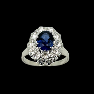 BAGUE EN OR GRIS 750 SERTIE DE SAPHIR OVAL ET 10 DIAMANTS