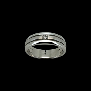 BAGUE EN OR GRIS 750 SERTIE D'UN DIAMANT DE 0,10CT