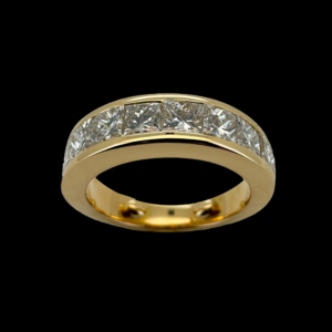 BAGUE DEMI-TOUR EN OR JAUNE 750 ET DIAMANTS
