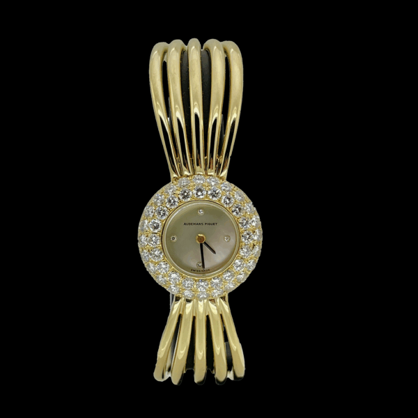 MONTRE AUDEMARS PIGUET EN OR JAUNE 750 DIAMANTS